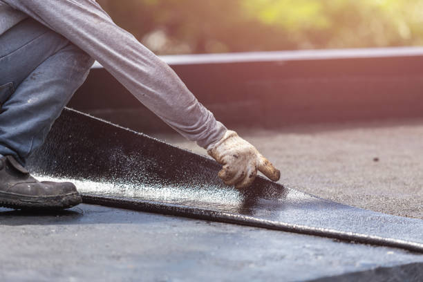 Professional Basement Waterproofing technician working in Fort Loramie, OH